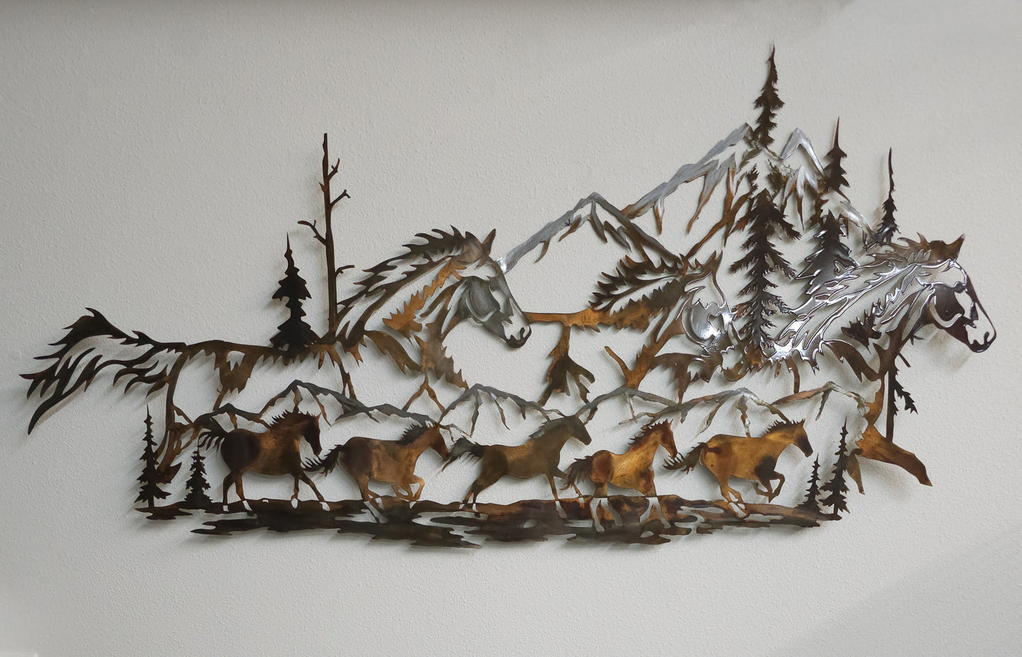 Wild Horses Rustic Metal Wall Hanging. Available in two sizes and five colors.