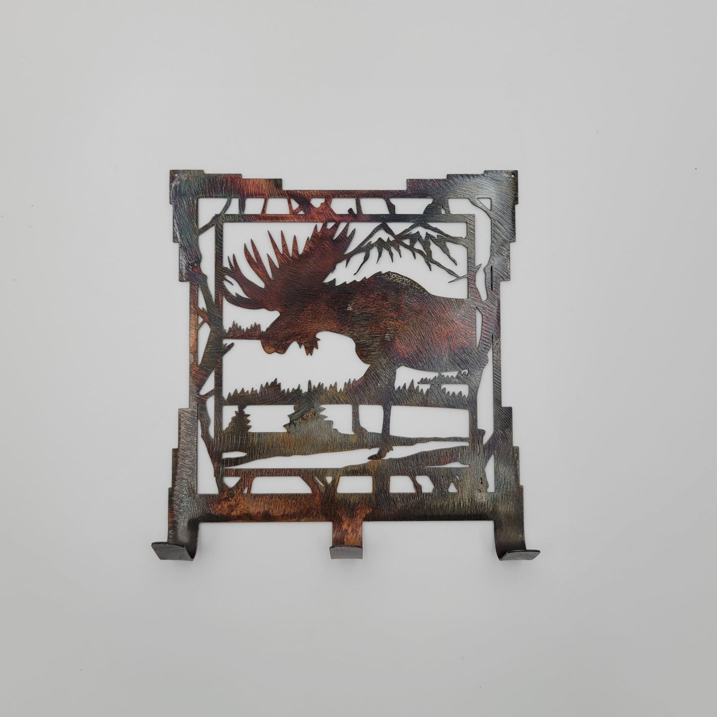 Southwest Moose Key Rack measures 6.25" W x 7" H. Three hooks for keys. Hangs via two nails, not included. Sprayed with several coats of Varathane.