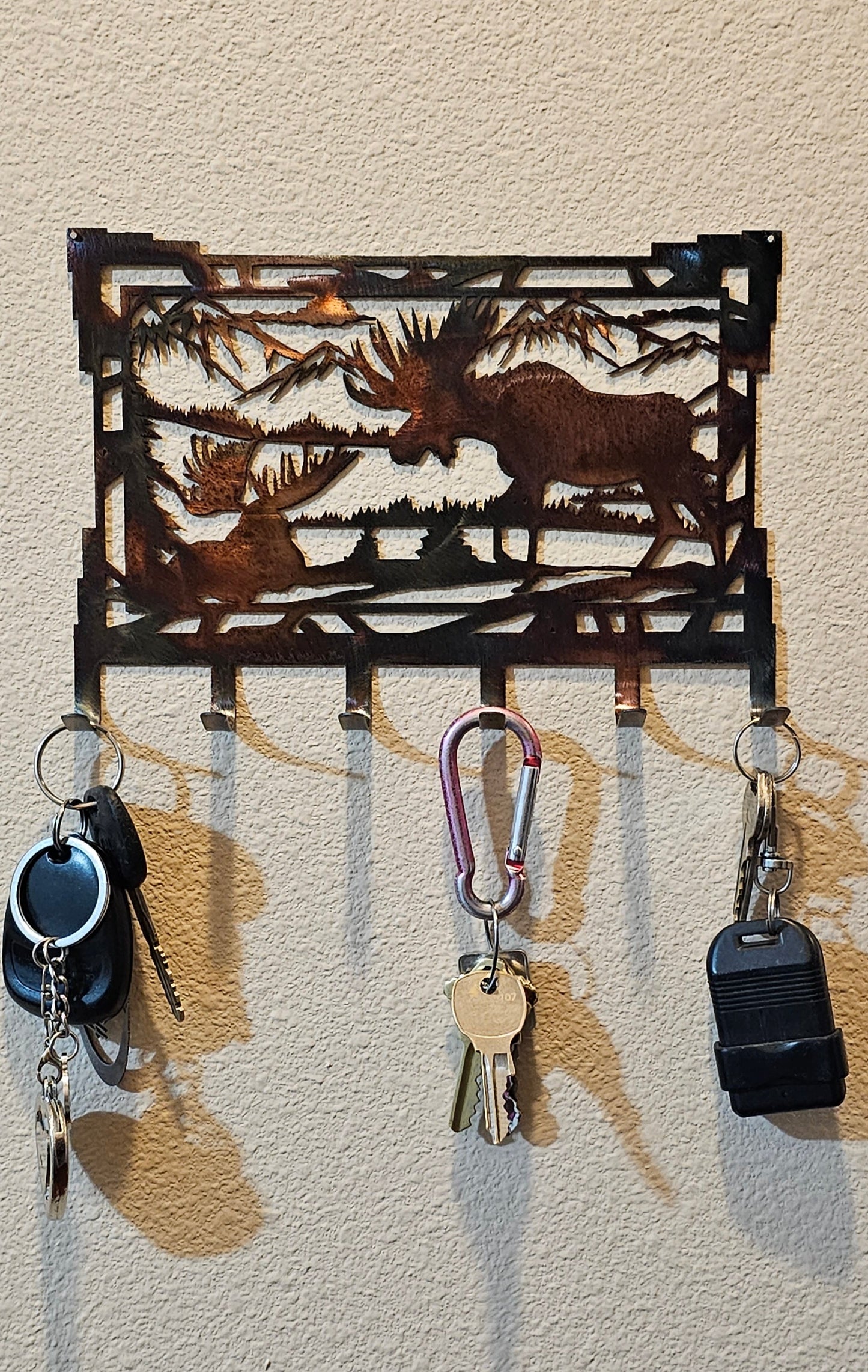 Southwest Moose Rectangular Key Rack With Keys.