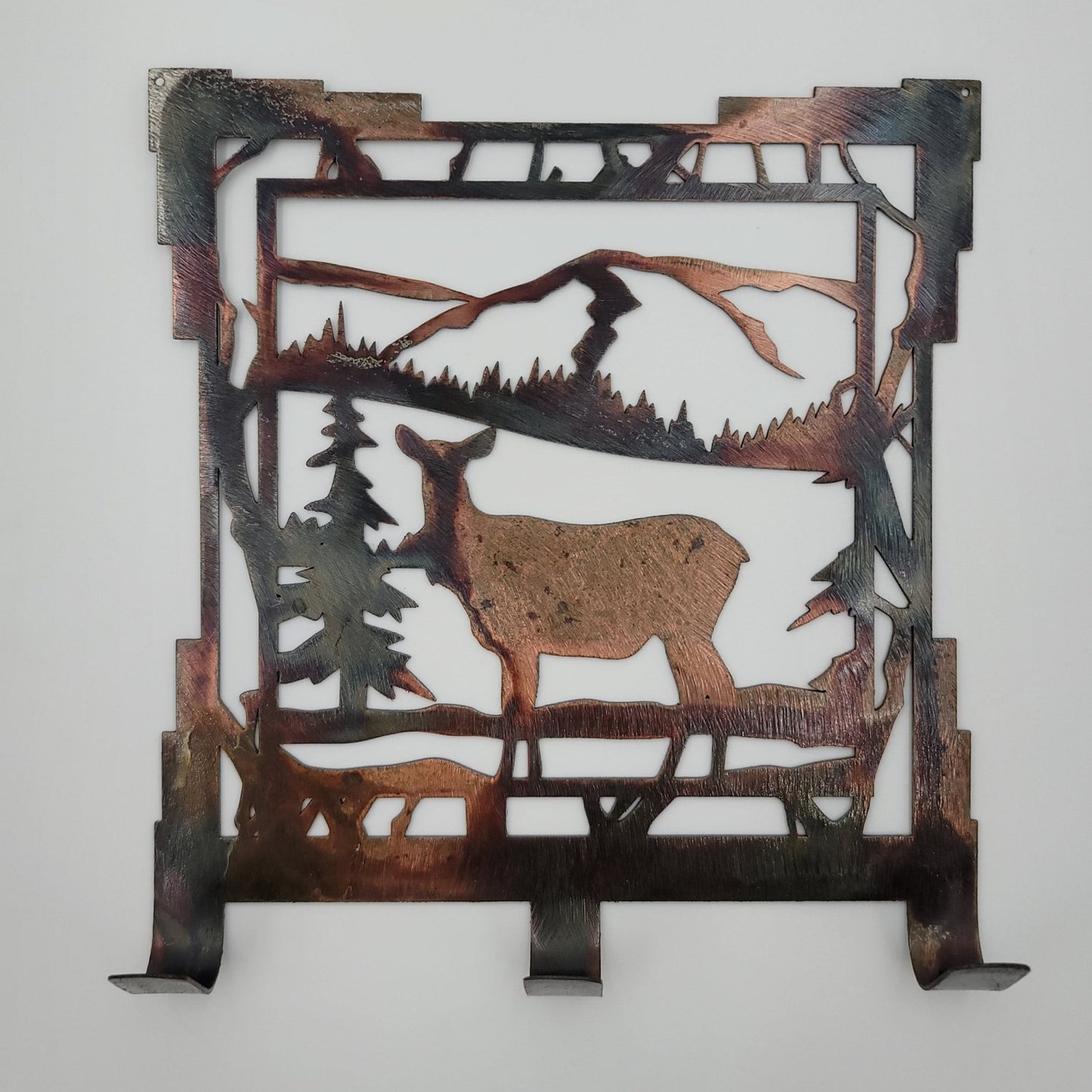 Southwest Deer Rustic Metal Key Rack. Measures 6.25 inches wide x 7 inches high x 18-gauge thick.