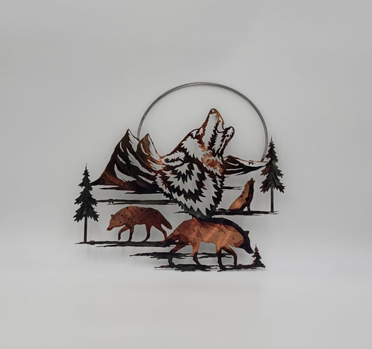 Wolf and Moon Metal Wall Hanging. Measures 12 1/2" High x 14" W x 18 gauge Thick. Tabs on back for easy hanging. Nails not included. Sprayed with several coats of Varathane.