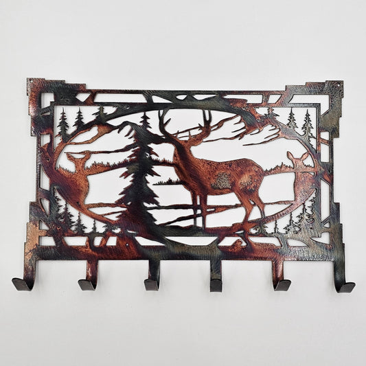 Deer Key Rack Very Rustic measures 8" wide x 5.5" high x 18 gauge. Six hooks for keys. Hangs via two nails not included. Sprayed with several coats of Varathane. Gift Wrapping available with all our metal art at checkout.
