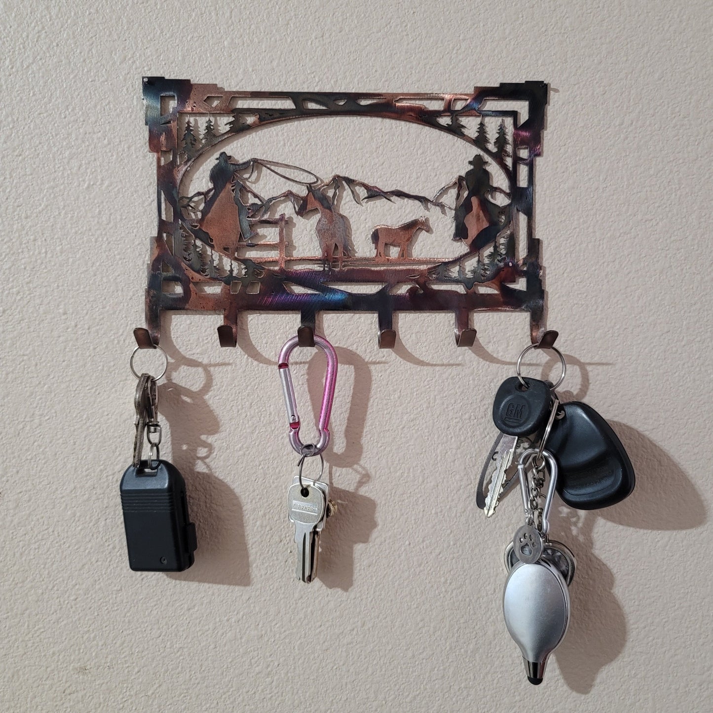 Southwest Roping Cowboys Rectangular Key Rack With Keys.