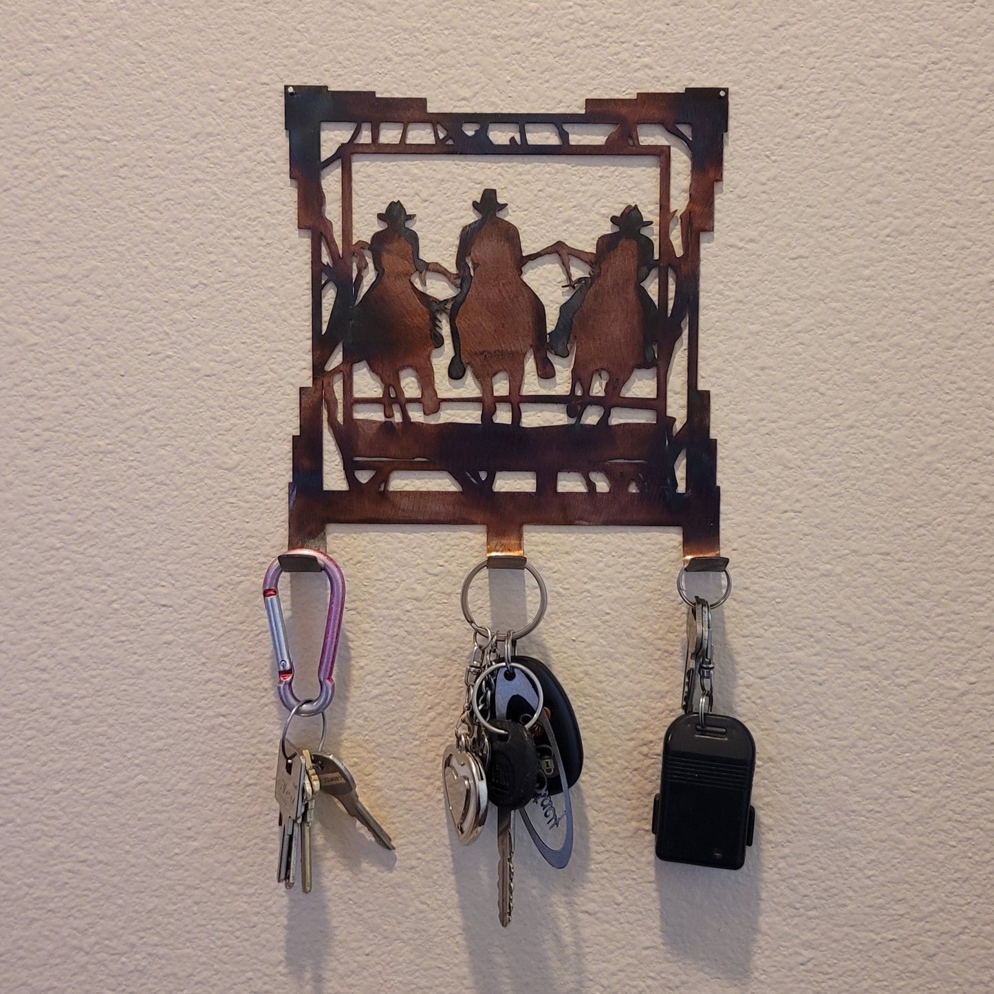 Rustic Cowboys Riding Horses Metal Key Rack