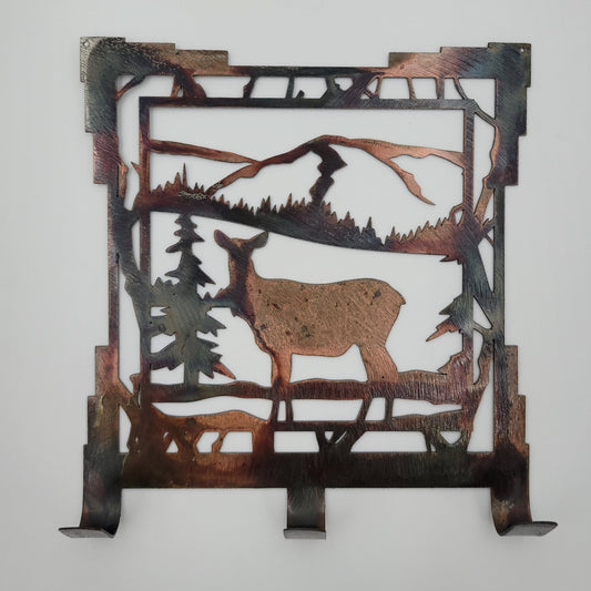 Southwest Deer Rustic Metal Key Rack. Measures 6.25 inches wide x 7 inches high x 18-gauge thick.